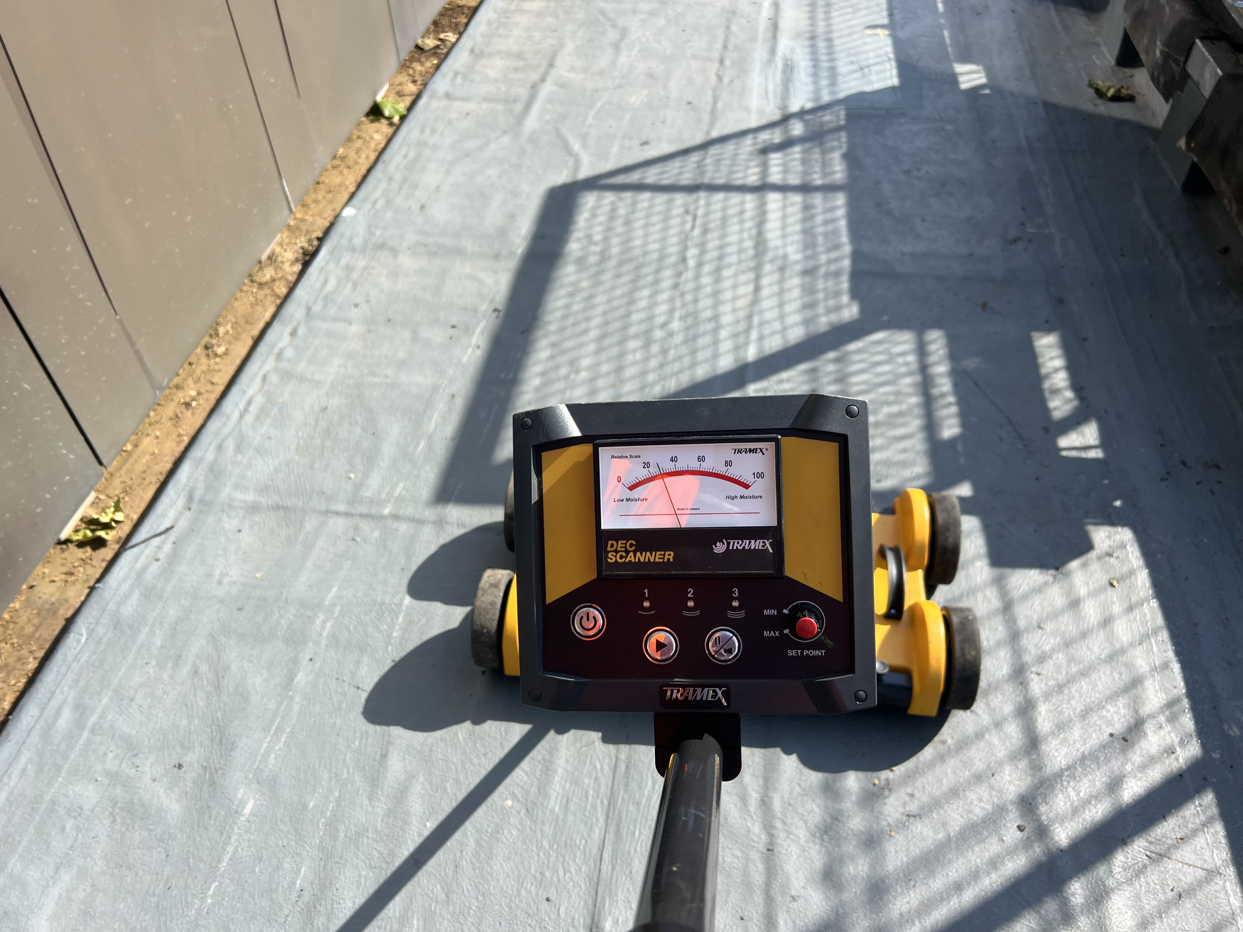 A RAM Building Consultancy worker conducting their moisture mapping service