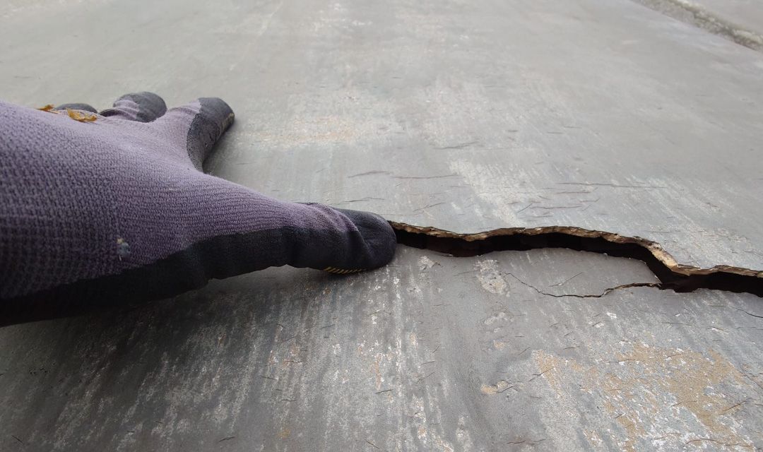 A roof survey being conducted, identifying holes